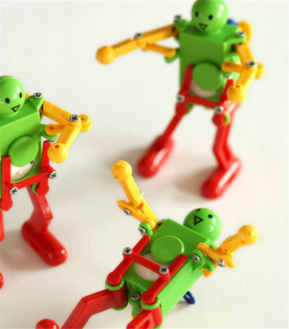 Colorful Clockwork Spring Wind up Dancing Walking Robot Toy Colorful Clockwork Spring Wind up Dancing Walking Robot Toy