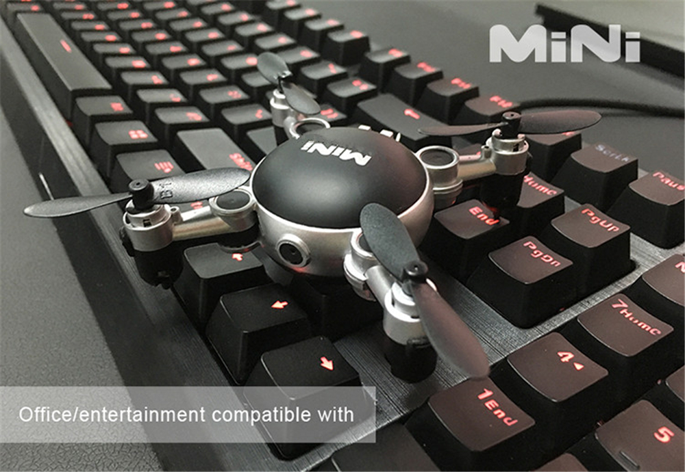 Mini Foldable RC Quadcopter Drone with Camera / 6 Axis Gyro / 360 Degree Roll Mini Foldable RC Quadcopter Drone with Camera / 6 Axis Gyro / 360 Degree Roll