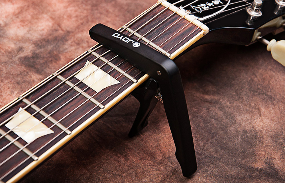 JOYO JCP - 01 Light Professional Capo with Pick for String Acoustic Electric Guitar JOYO JCP - 01 Light Professional Capo with Pick for String Acoustic Electric Guitar