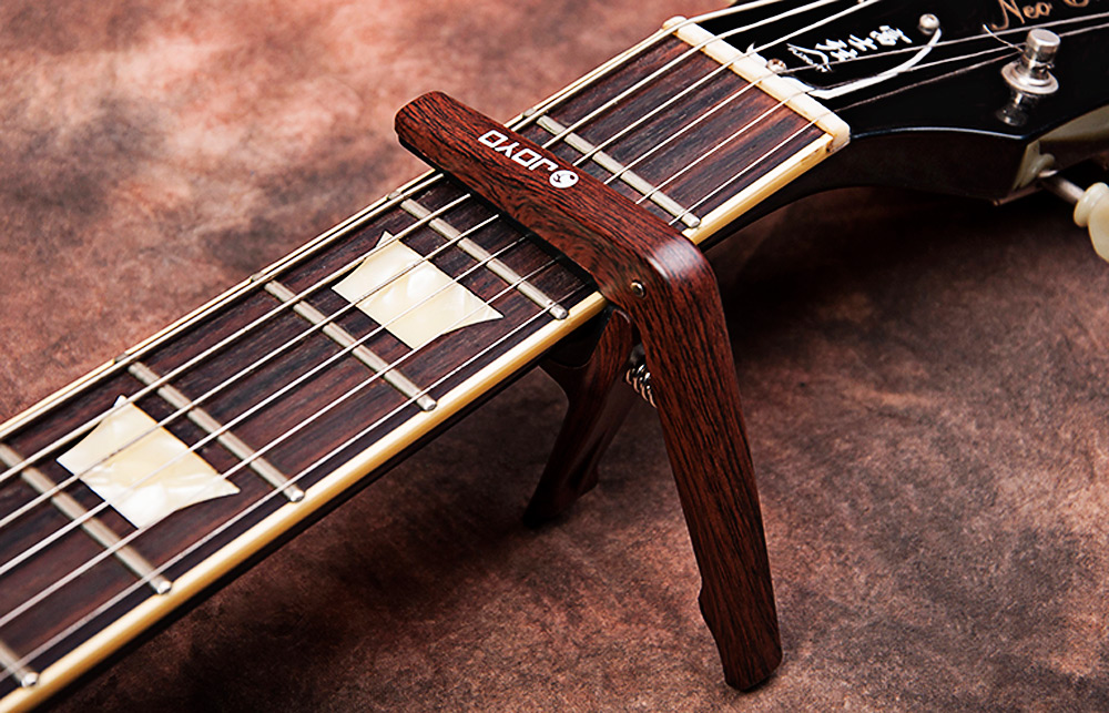 JOYO JCP - 01 Light Professional Capo with Pick for String Acoustic Electric Guitar JOYO JCP - 01 Light Professional Capo with Pick for String Acoustic Electric Guitar